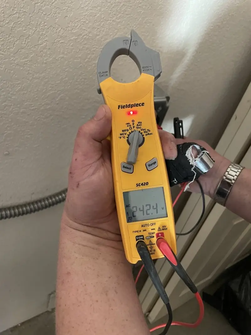 Voltage testing with clamp meter during Hot Tub / Pool Electrical Wiring in Albion